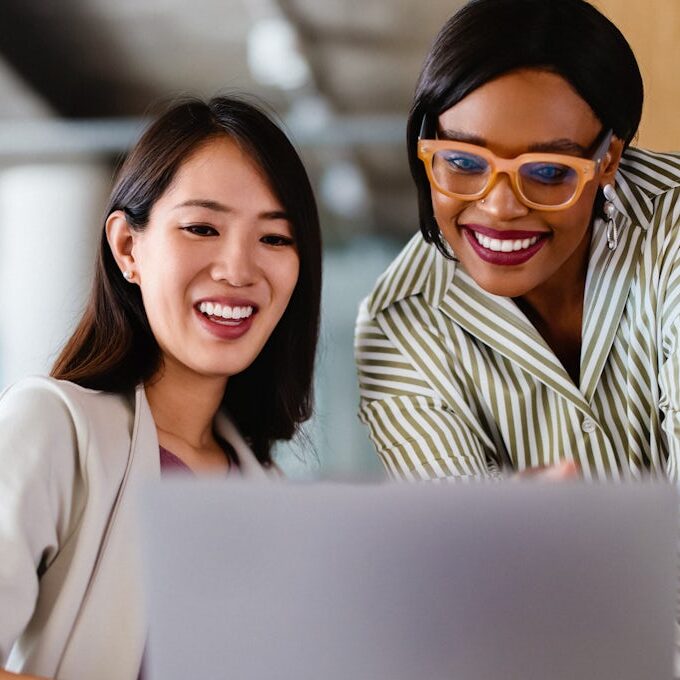 Two marketing professionals collaborating